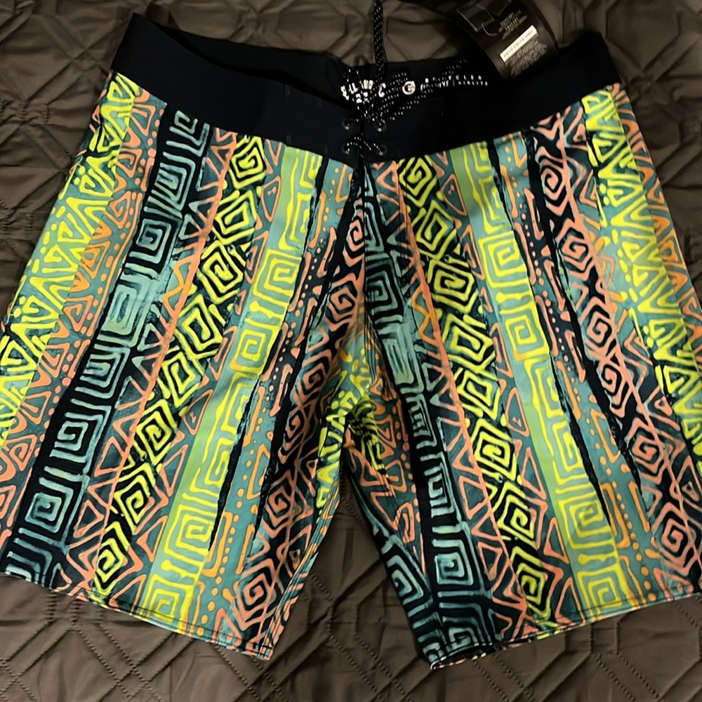 Billabong Green and Blue Board Shorts with Geometric Patterns